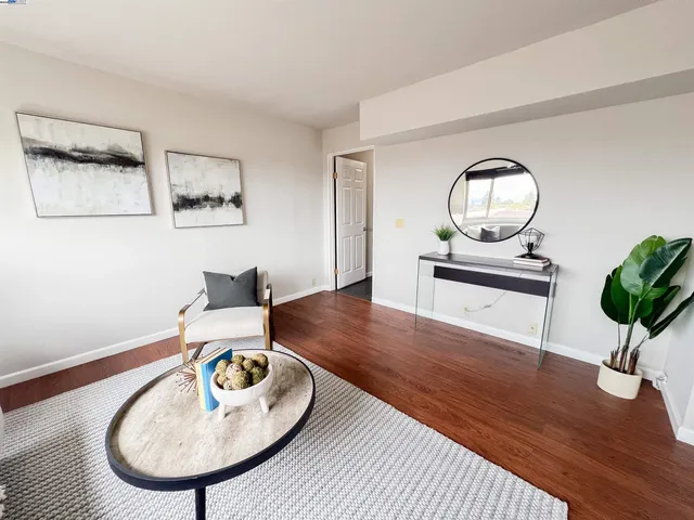a dining room with furniture window wooden floor