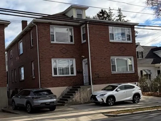 a car parked in front of a building