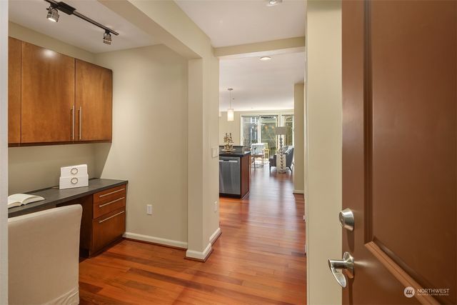 a view of a kitchen cabinets and wooden floor