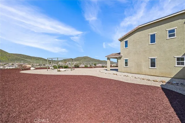 a view of a terrace with sitting area