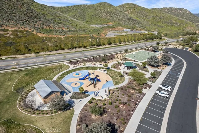 an aerial view of residential houses with outdoor space