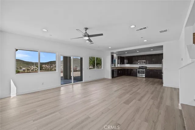a view of kitchen with furniture and window
