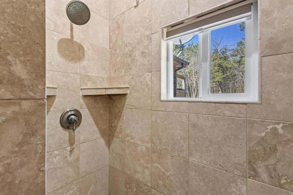 236 Homesite Road Pottsboro, TX 75076 - Photo 34 of 40 a bathroom with a shower