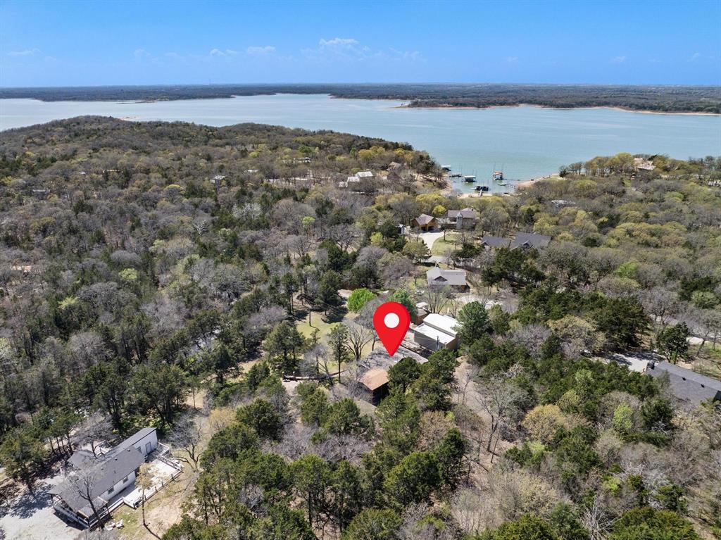 236 Homesite Road Pottsboro, TX 75076 - Photo 7 of 40 a front view of a house with a lake