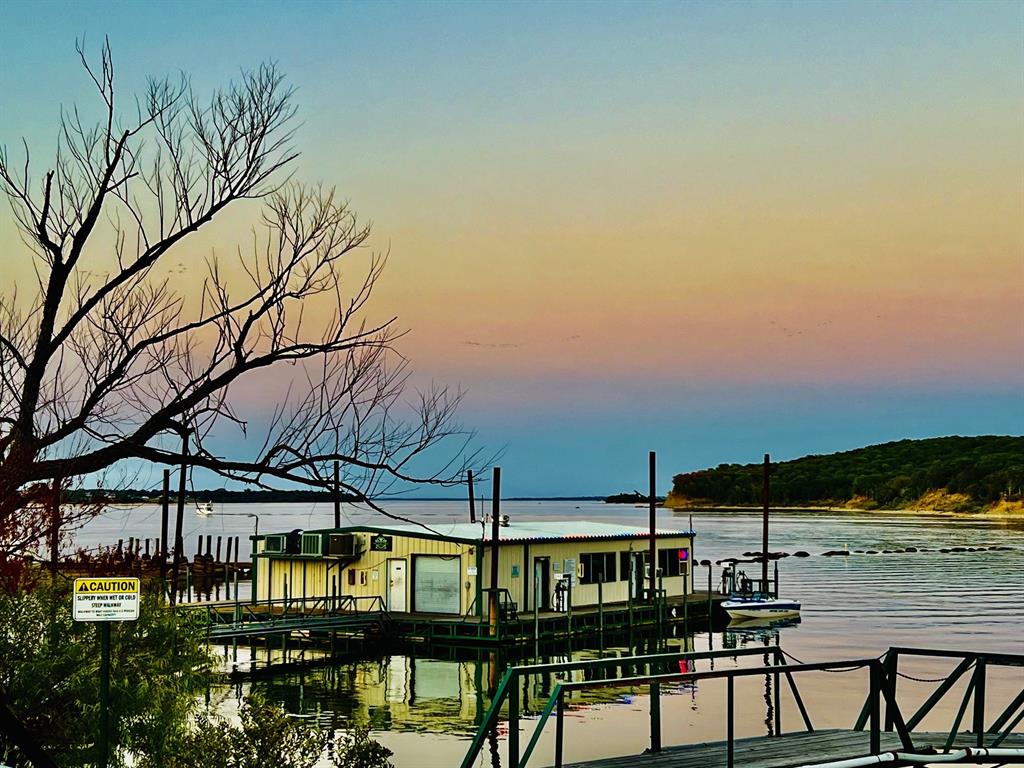 236 Homesite Road Pottsboro, TX 75076 - Photo 9 of 40 a view of a chairs and table in the patio
