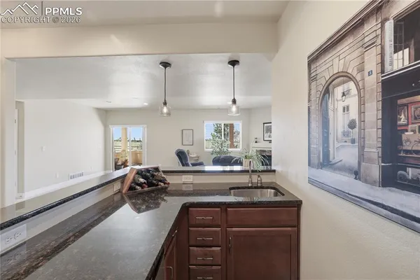 a view of a kitchen counter top and stove