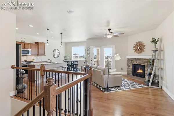 a view of a livingroom with furniture and fireplace