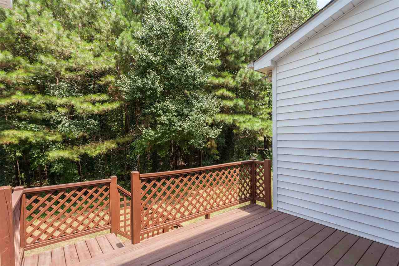 5445 Cottonrose Lane Raleigh, NC 27606 - Photo 18 of 22 Wooded view from deck