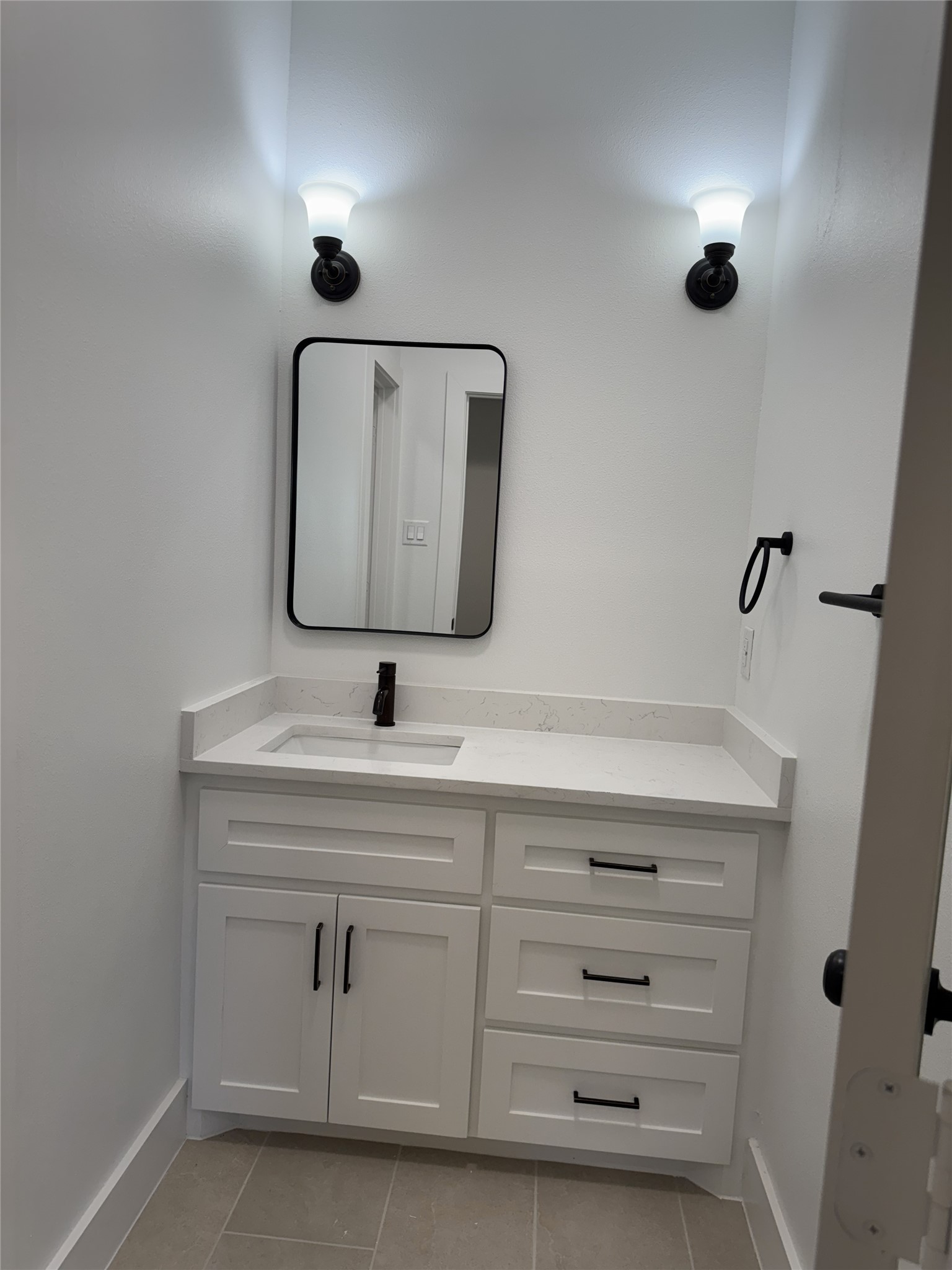 8437 Winthrop Lane Houston, TX 77075 - Photo 11 of 22 a bathroom with a sink vanity and mirror