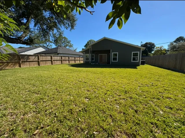 a house view with a garden space