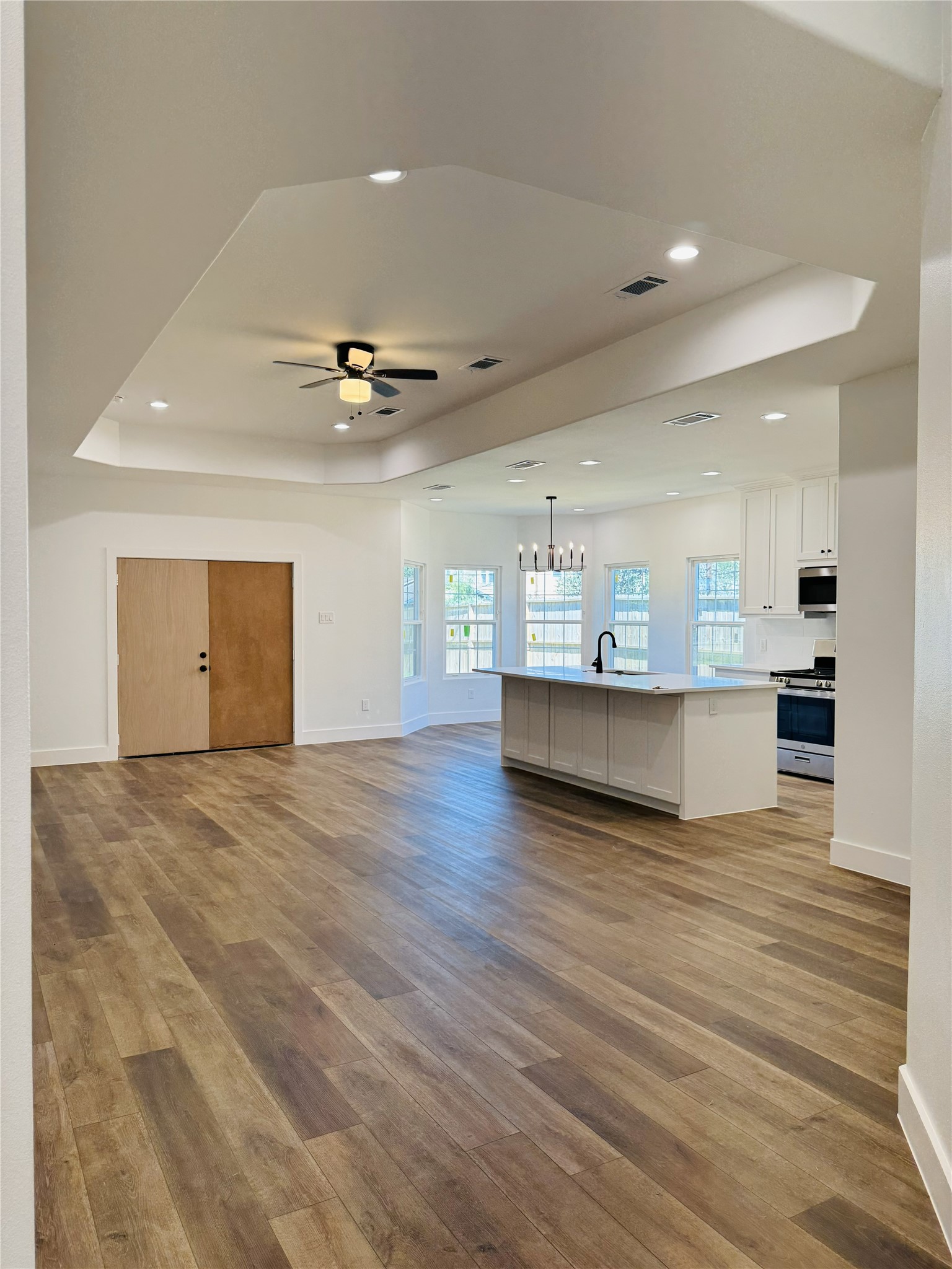 8437 Winthrop Lane Houston, TX 77075 - Photo 5 of 22 a view of a kitchen with a sink and a refrigerator