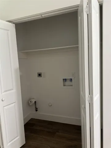 a view of small space with wooden floor