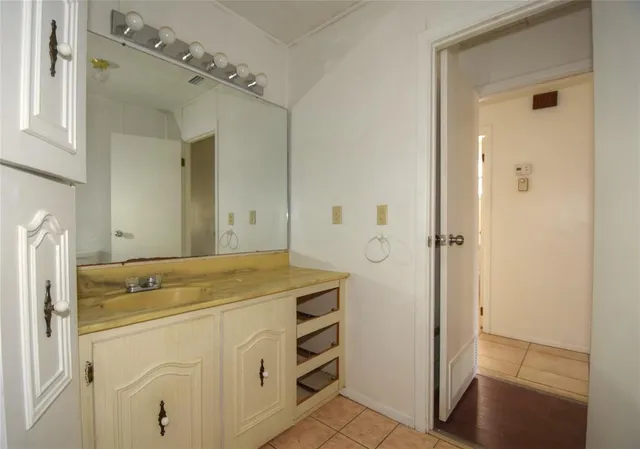 a view of a chair and table in the balcony