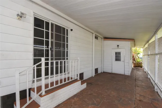 a kitchen with a sink and a stove