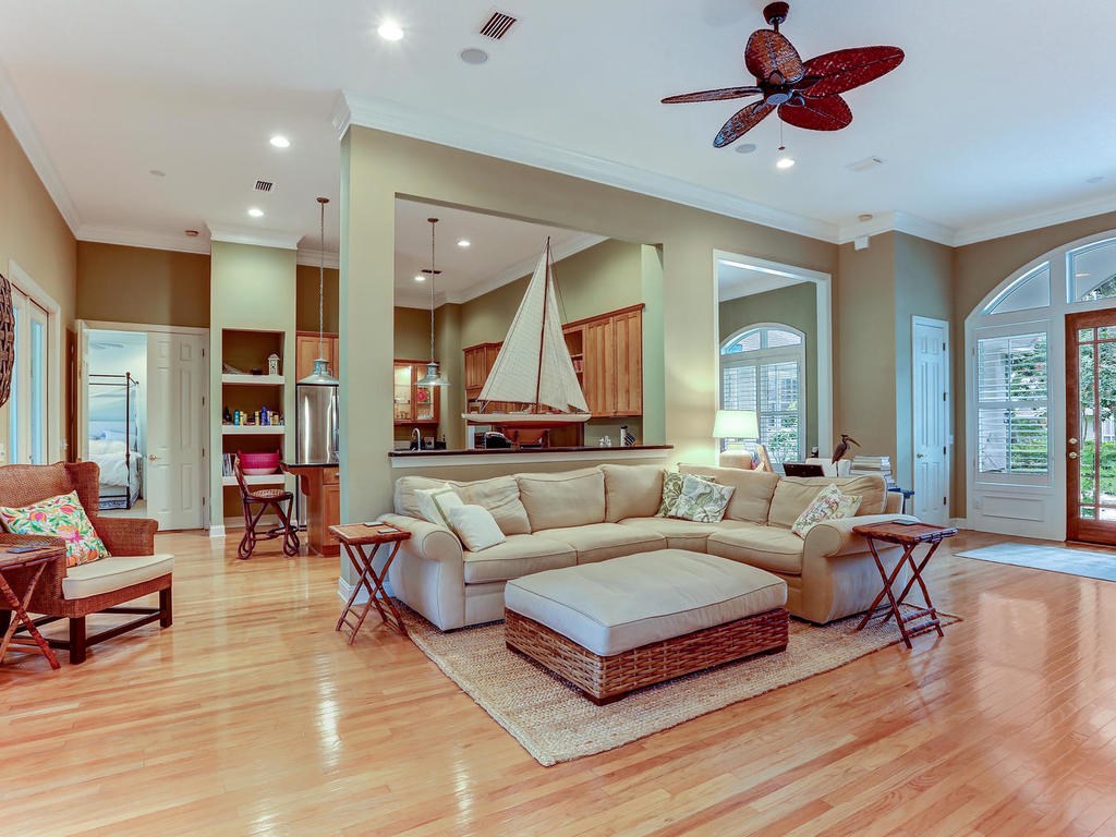 71 Sea Marsh Road Amelia Island, FL 32034 - Photo 23 of 26 a living room with furniture kitchen view and a large window