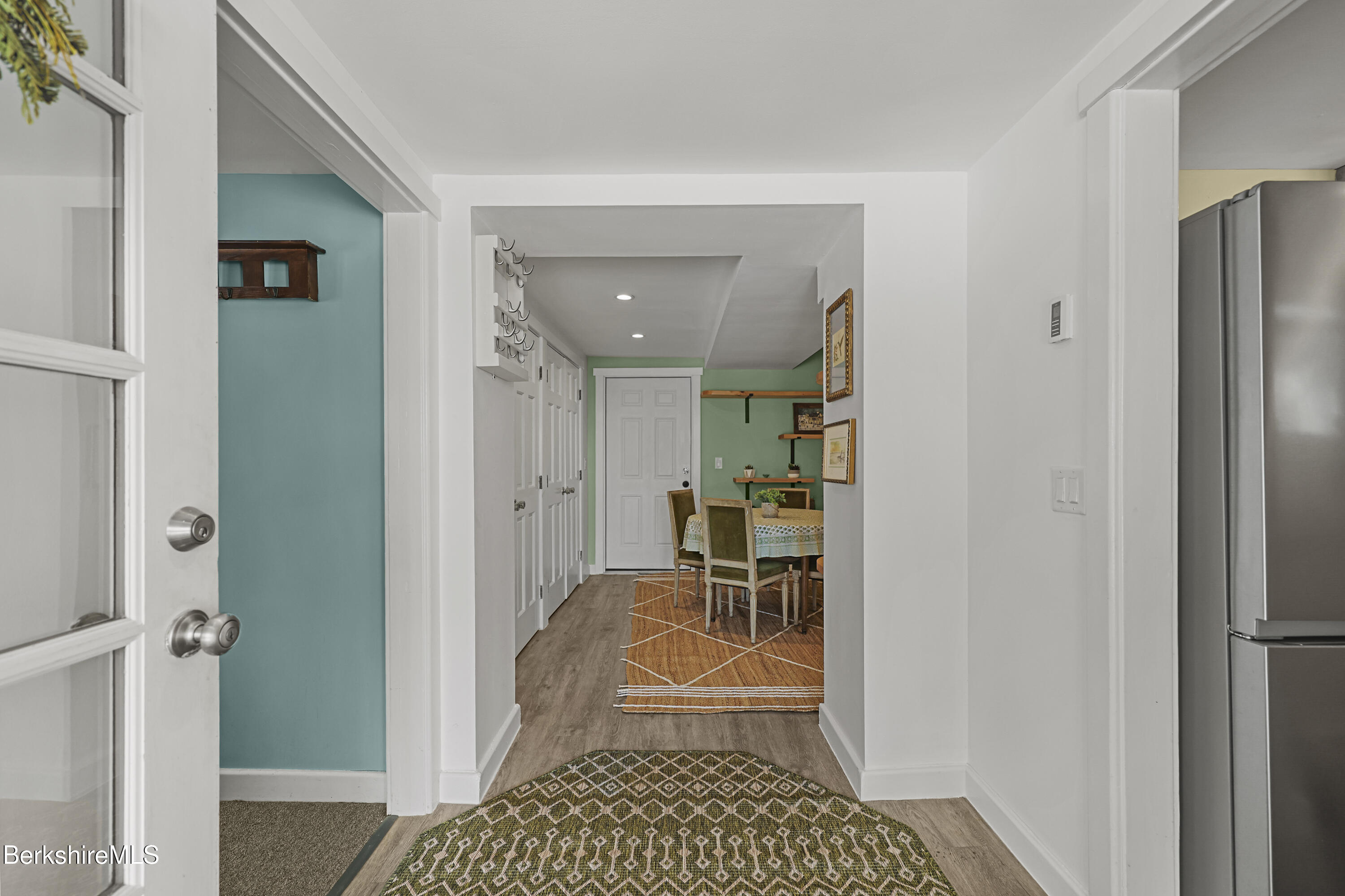 2 Wallace Road, Unit DHB Stockbridge, MA 01262 - Photo 12 of 36 a view of a hallway with wooden floor and a bathroom