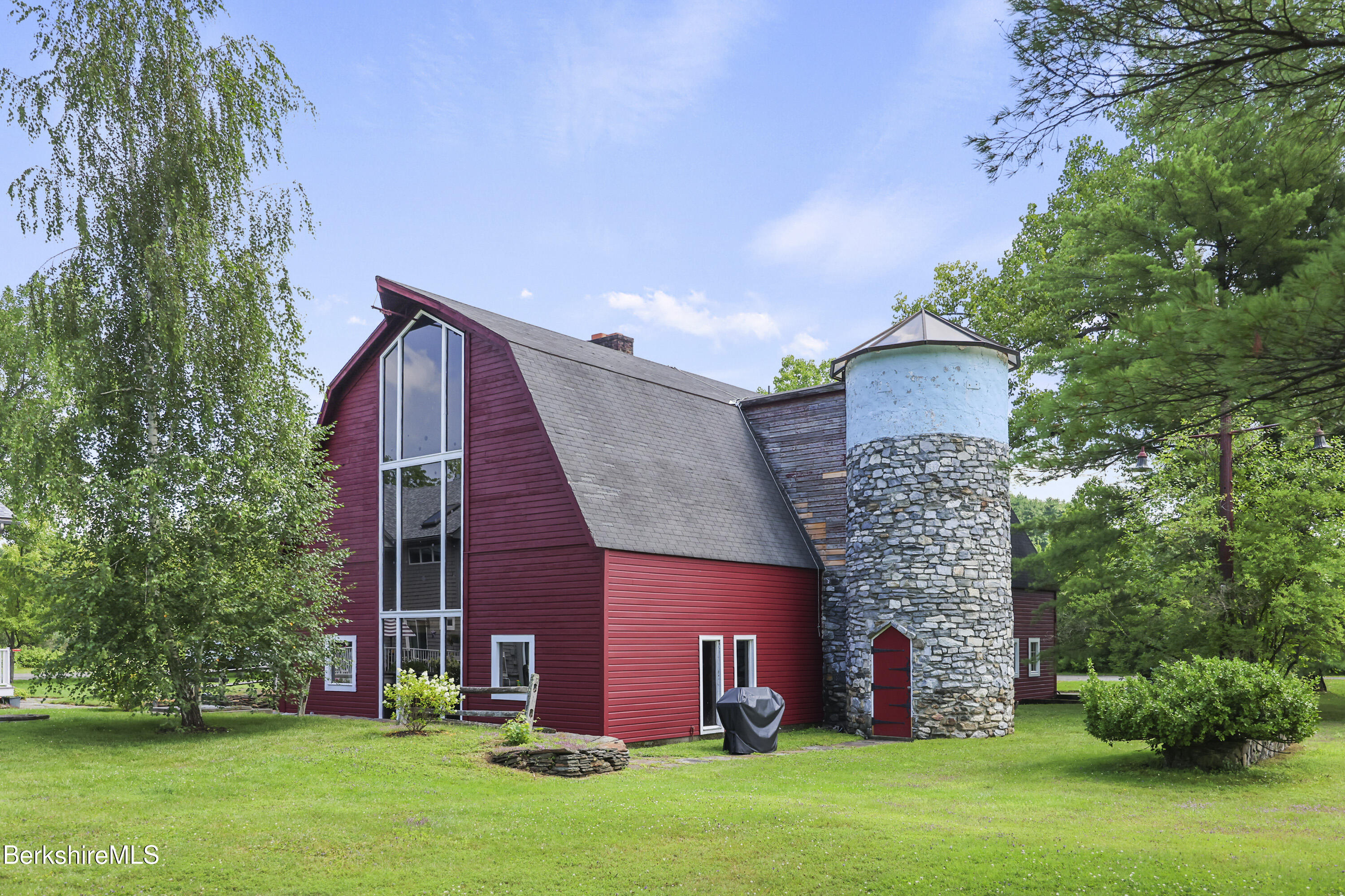 2 Wallace Road, Unit DHB Stockbridge, MA 01262 - Photo 26 of 36 a view of a house with a yard