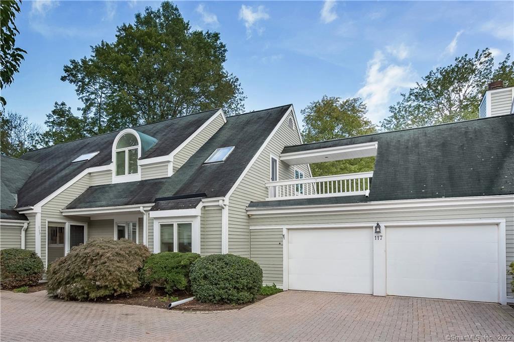 117 Barnes Road Stamford, CT 06902 - Photo 1 of 1 a front view of a house with a garage