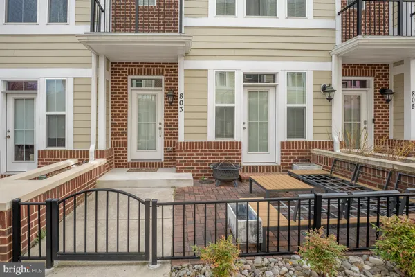a front view of a house with a porch