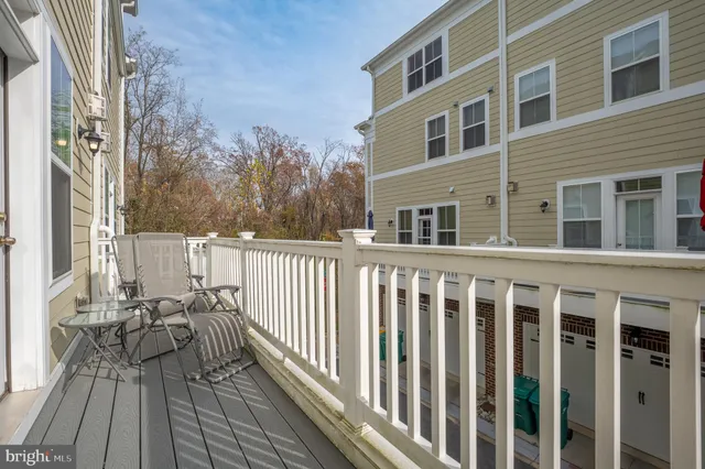 a view of a brick building from a balcony