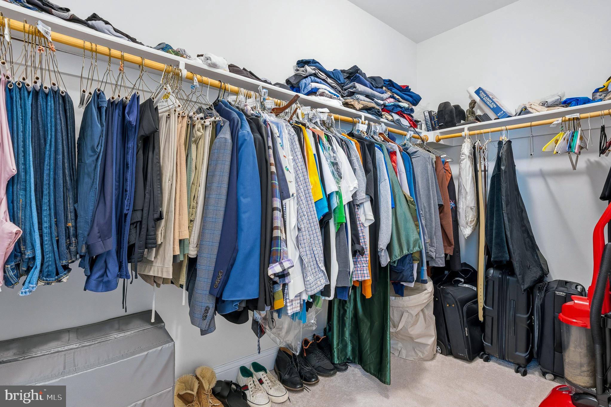 803 Francis Harris Place Annapolis, MD 21401 - Photo 32 of 52 a view of walk in closet with clothes