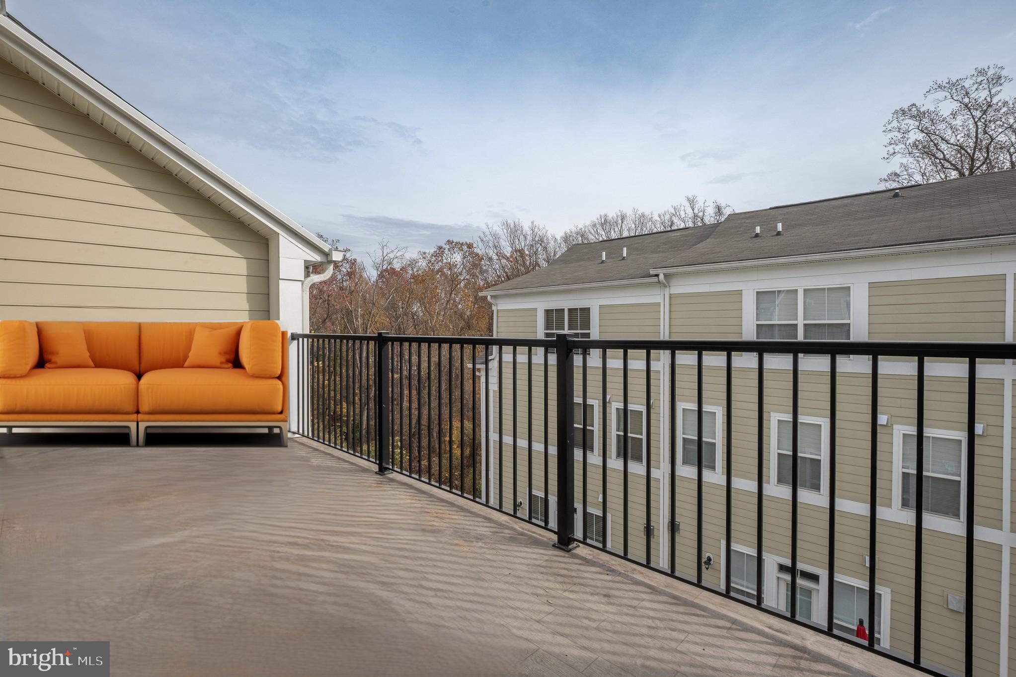 803 Francis Harris Place Annapolis, MD 21401 - Photo 40 of 52 a balcony with a couch