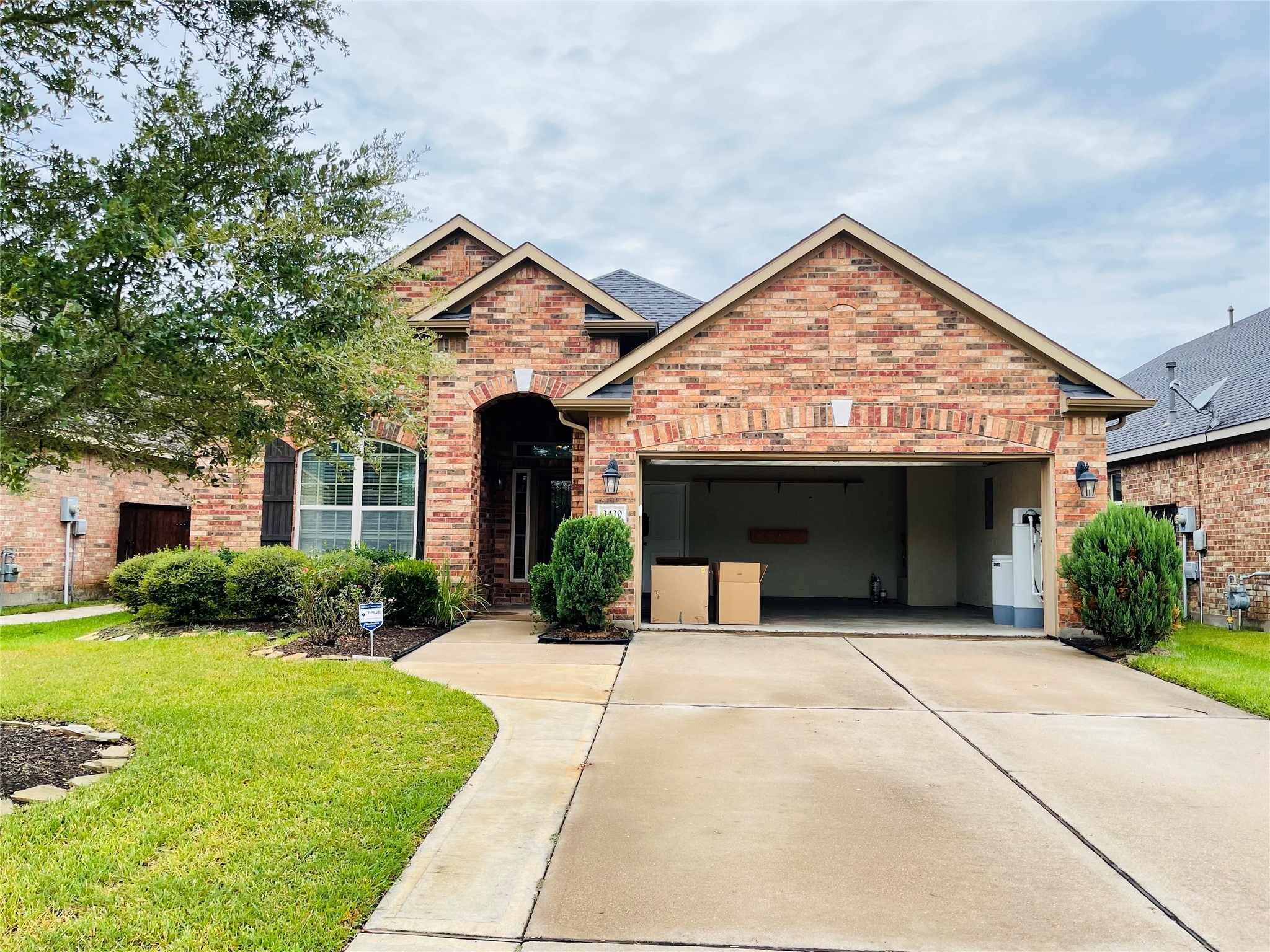a view of a house with outdoor space and porch