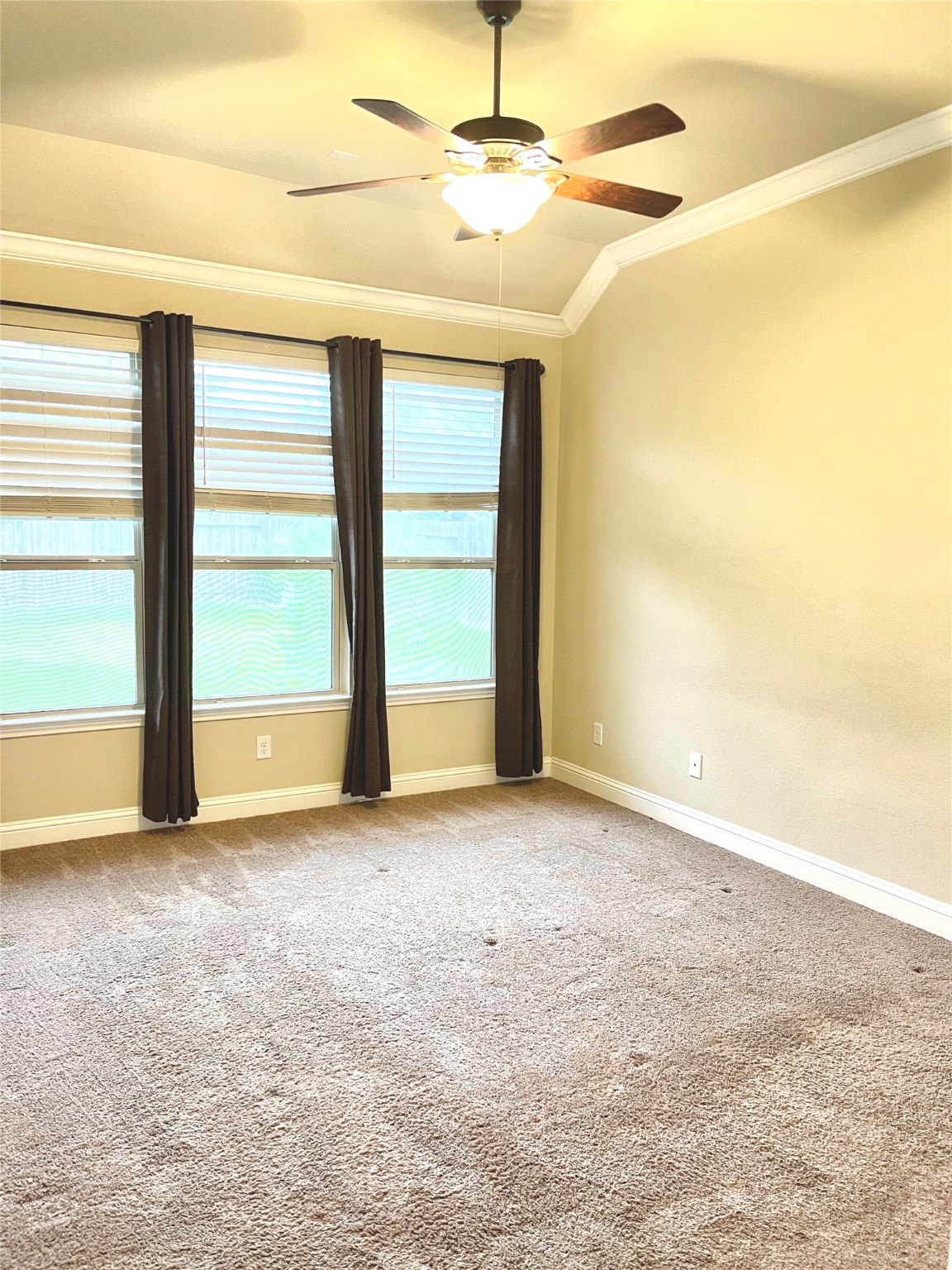 3430 Smart Sands Lane Fulshear, TX 77441 - Photo 15 of 25 an empty room with windows and fan
