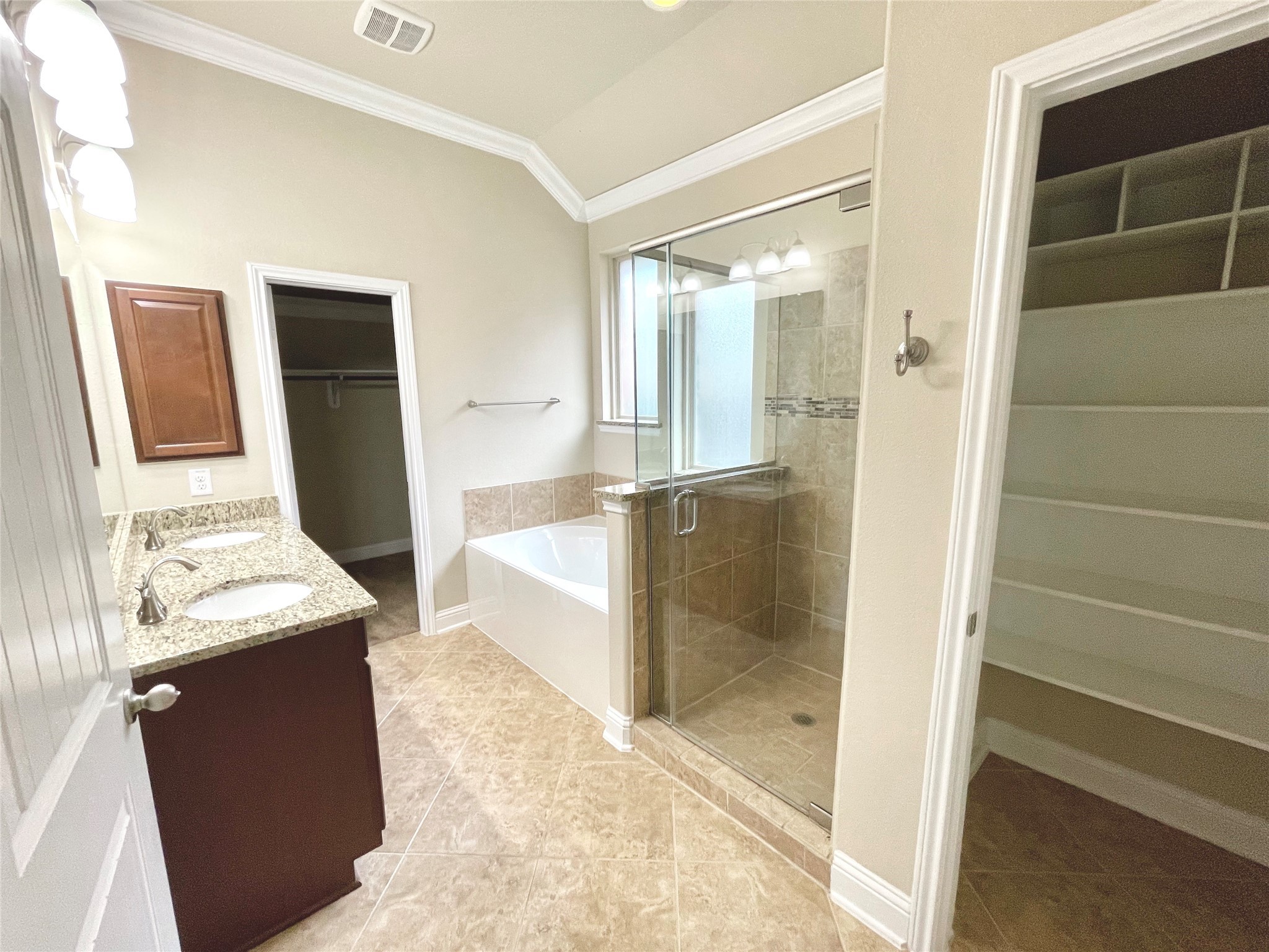 3430 Smart Sands Lane Fulshear, TX 77441 - Photo 16 of 25 a bathroom with a granite countertop sink and a mirror