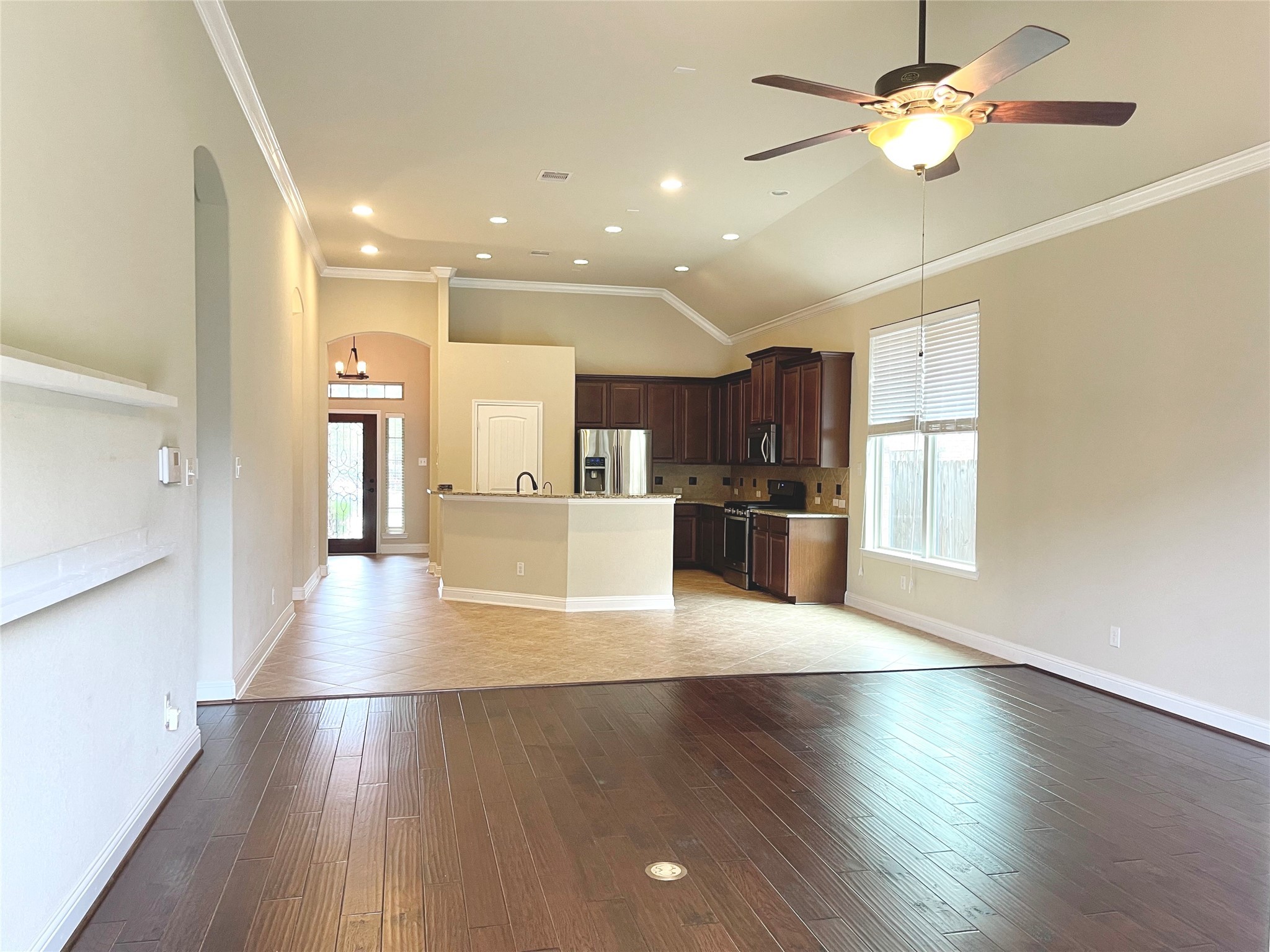 3430 Smart Sands Lane Fulshear, TX 77441 - Photo 24 of 25 a view of kitchen with cabinets and wooden floor