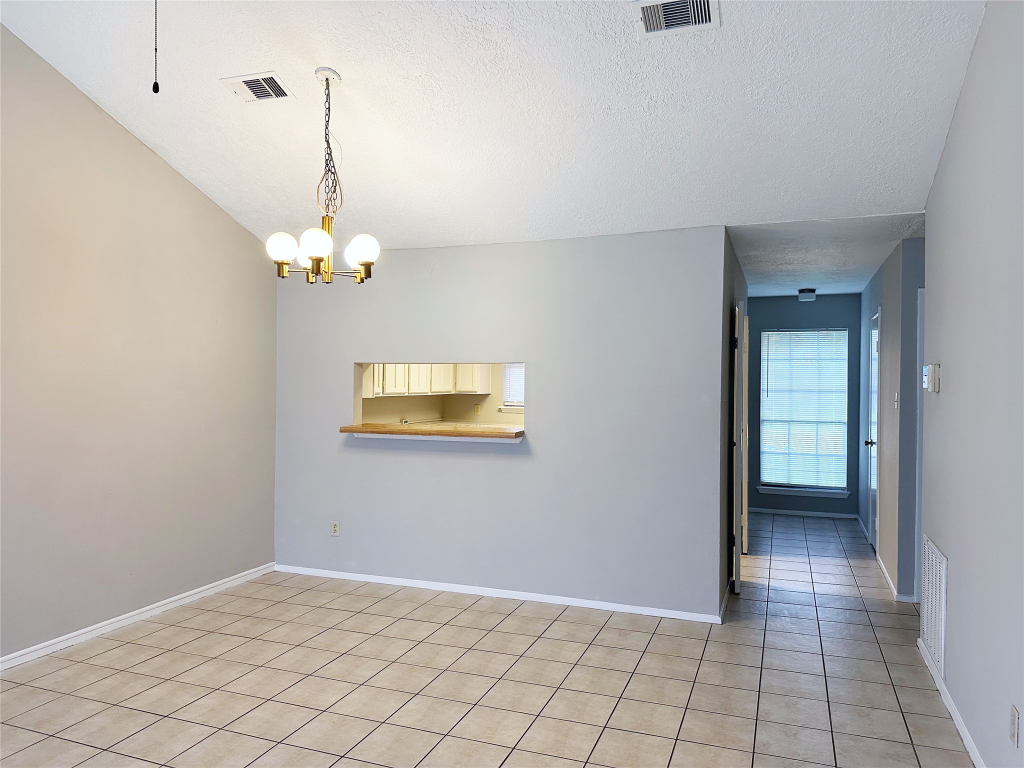 2402 Spring Dusk Drive Spring, TX 77373 - Photo 3 of 8 a view of an empty room with a mirror