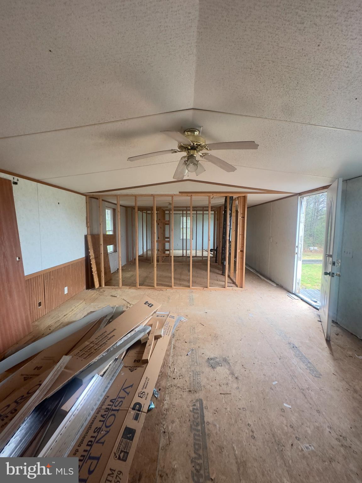 7833 Courthouse Road Heathsville, VA 22473 - Photo 4 of 18 a view of a living room and wooden floor