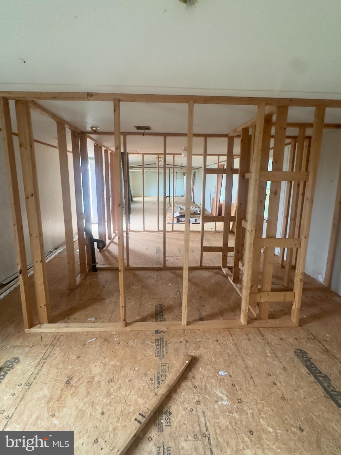 7833 Courthouse Road Heathsville, VA 22473 - Photo 5 of 18 a view of a hall with wooden floor