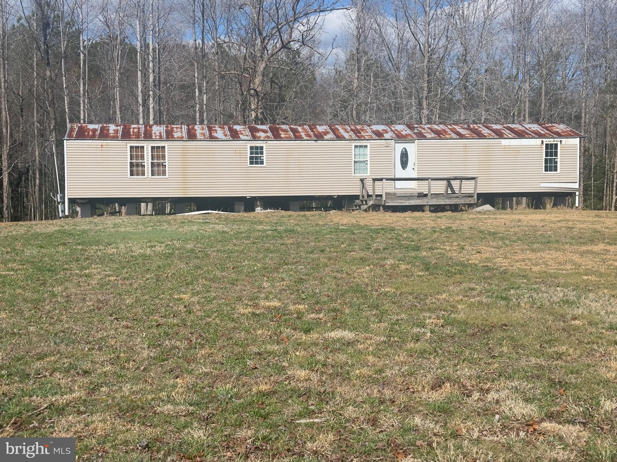 7833 Courthouse Road Heathsville, VA 22473 - Photo 8 of 18 a view of a yard with wooden fence