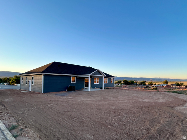 6 South 450th West Gunnison, UT 84634 - Photo 7 of 45 Contemporary single-story residence featuring a dark blue facade with white trim