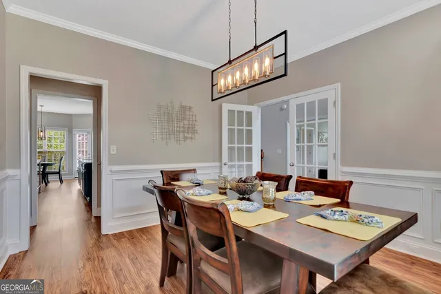 a bedroom with furniture and flat screen tv