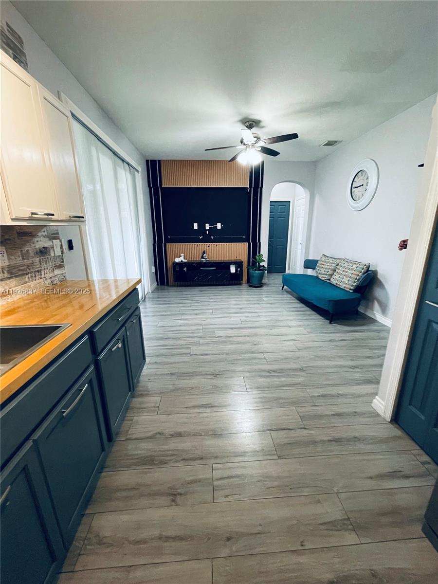 27312 Southwest 138th Path Homestead, FL 33032 - Photo 13 of 41 a view of a kitchen from a hallway