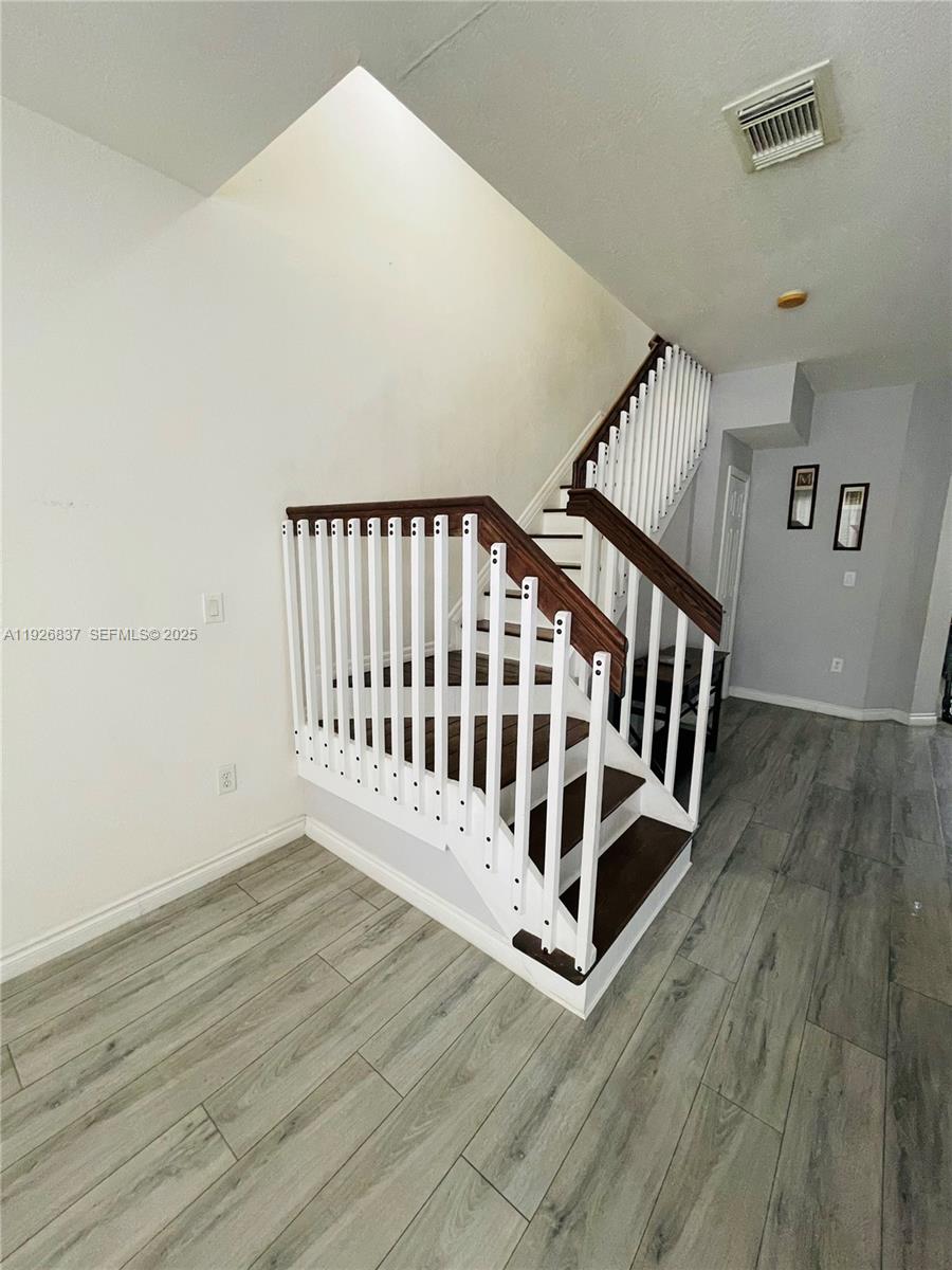 27312 Southwest 138th Path Homestead, FL 33032 - Photo 17 of 41 a view of a wooden floor and white walls
