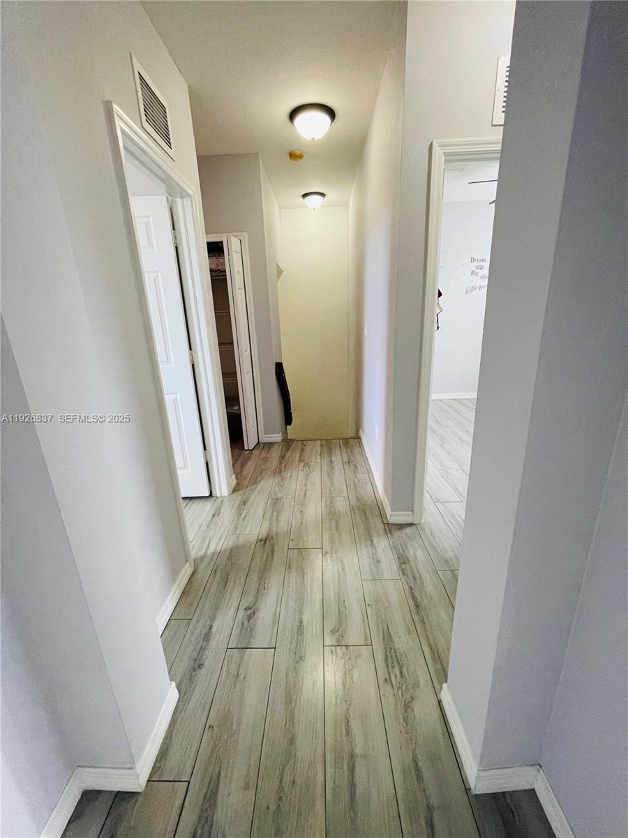 27312 Southwest 138th Path Homestead, FL 33032 - Photo 18 of 41 wooden floor in a gallery