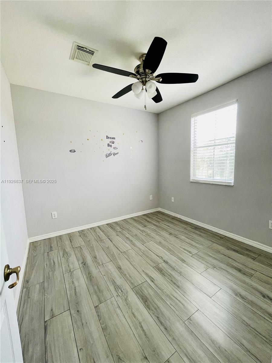 27312 Southwest 138th Path Homestead, FL 33032 - Photo 27 of 41 wooden floor in an empty room