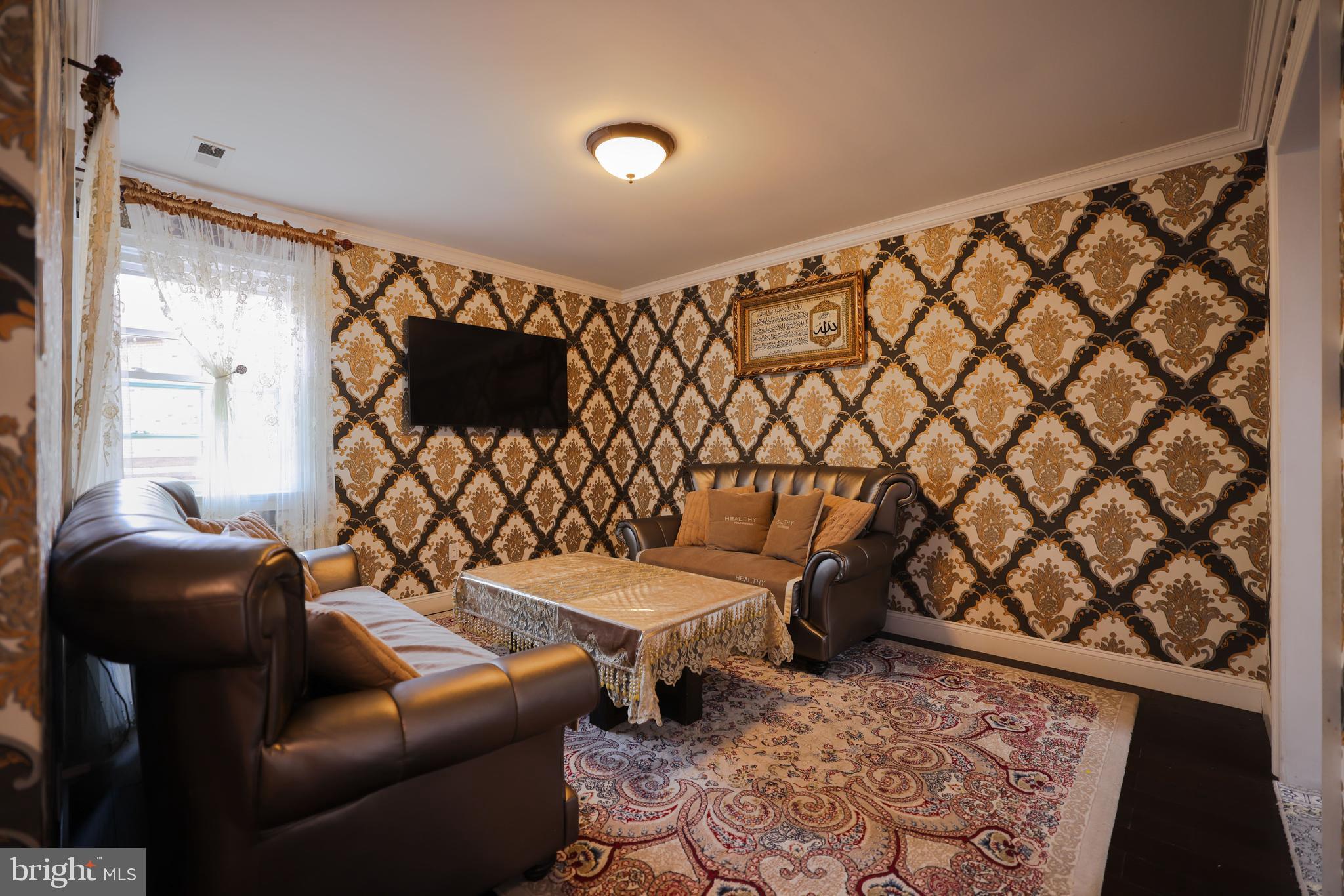 103 Garrison Court Langhorne, PA 19047 - Photo 17 of 46 a living room with furniture and a rug