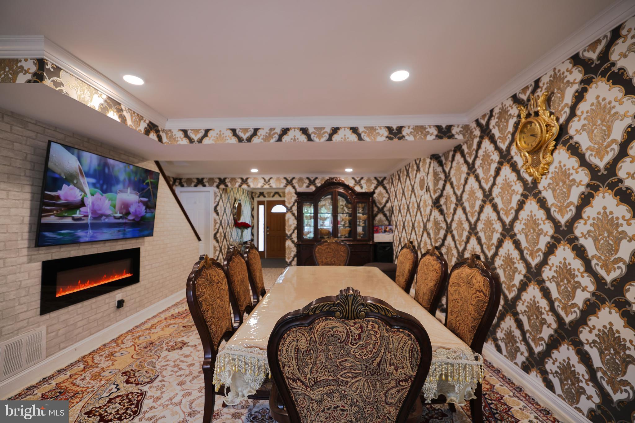 103 Garrison Court Langhorne, PA 19047 - Photo 21 of 46 a living room with furniture and a flat screen tv
