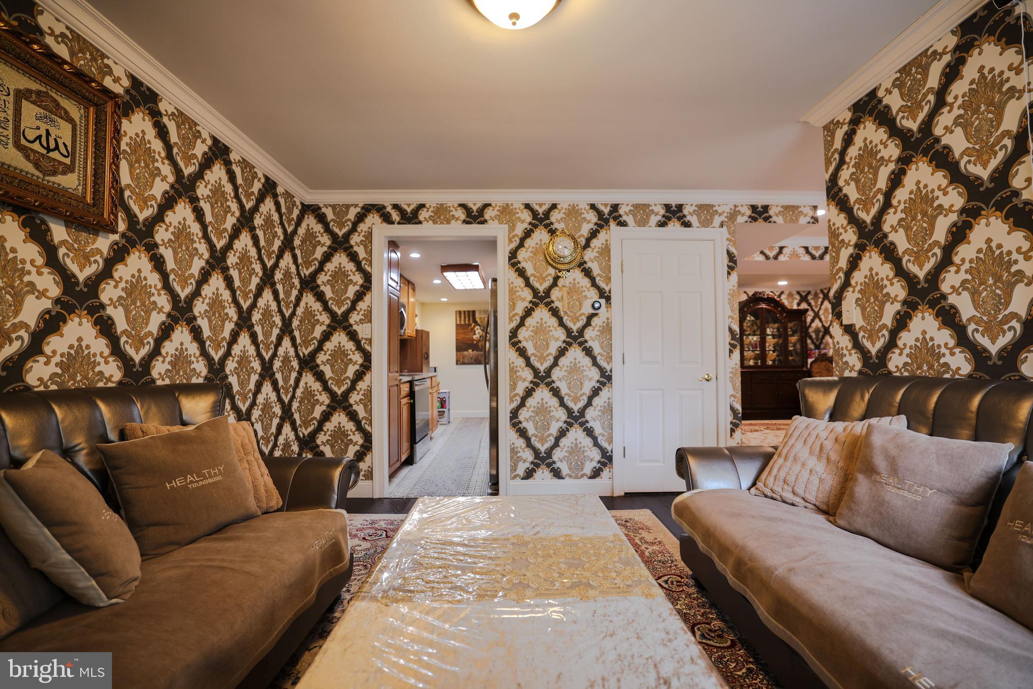 103 Garrison Court Langhorne, PA 19047 - Photo 22 of 46 a living room with a couch and a rug