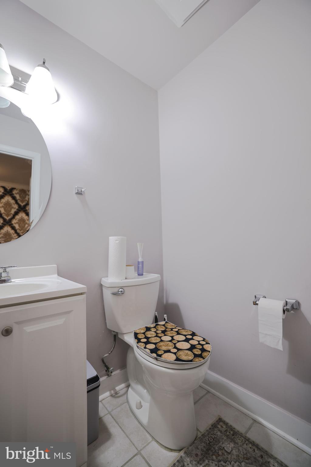 103 Garrison Court Langhorne, PA 19047 - Photo 34 of 46 a bathroom with a sink a toilet and a mirror