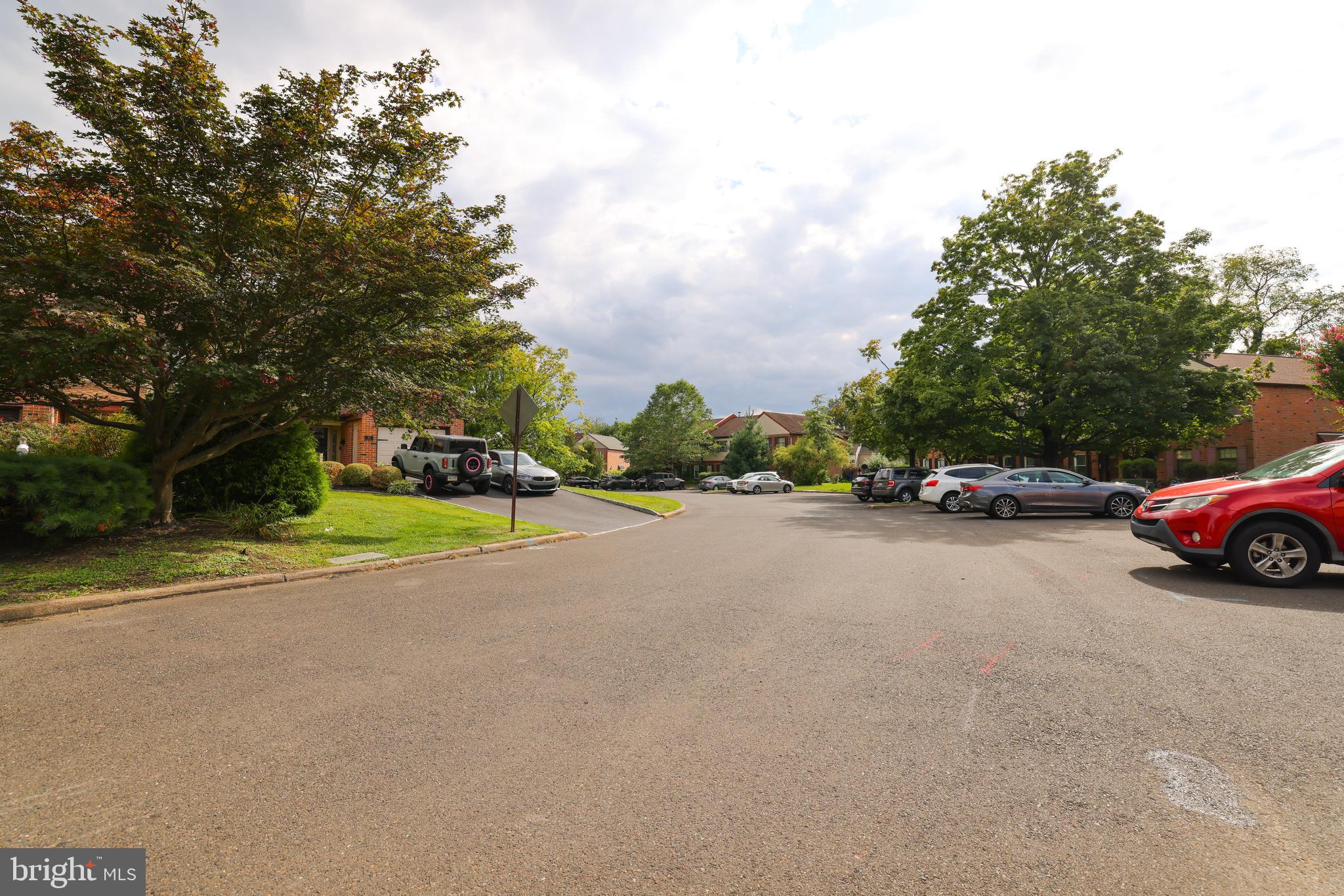 103 Garrison Court Langhorne, PA 19047 - Photo 6 of 46 a view of street with parked cars