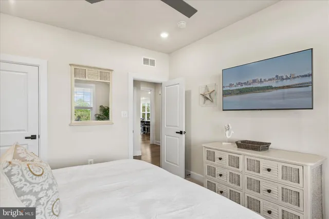 a bathroom with double sink and a mirror