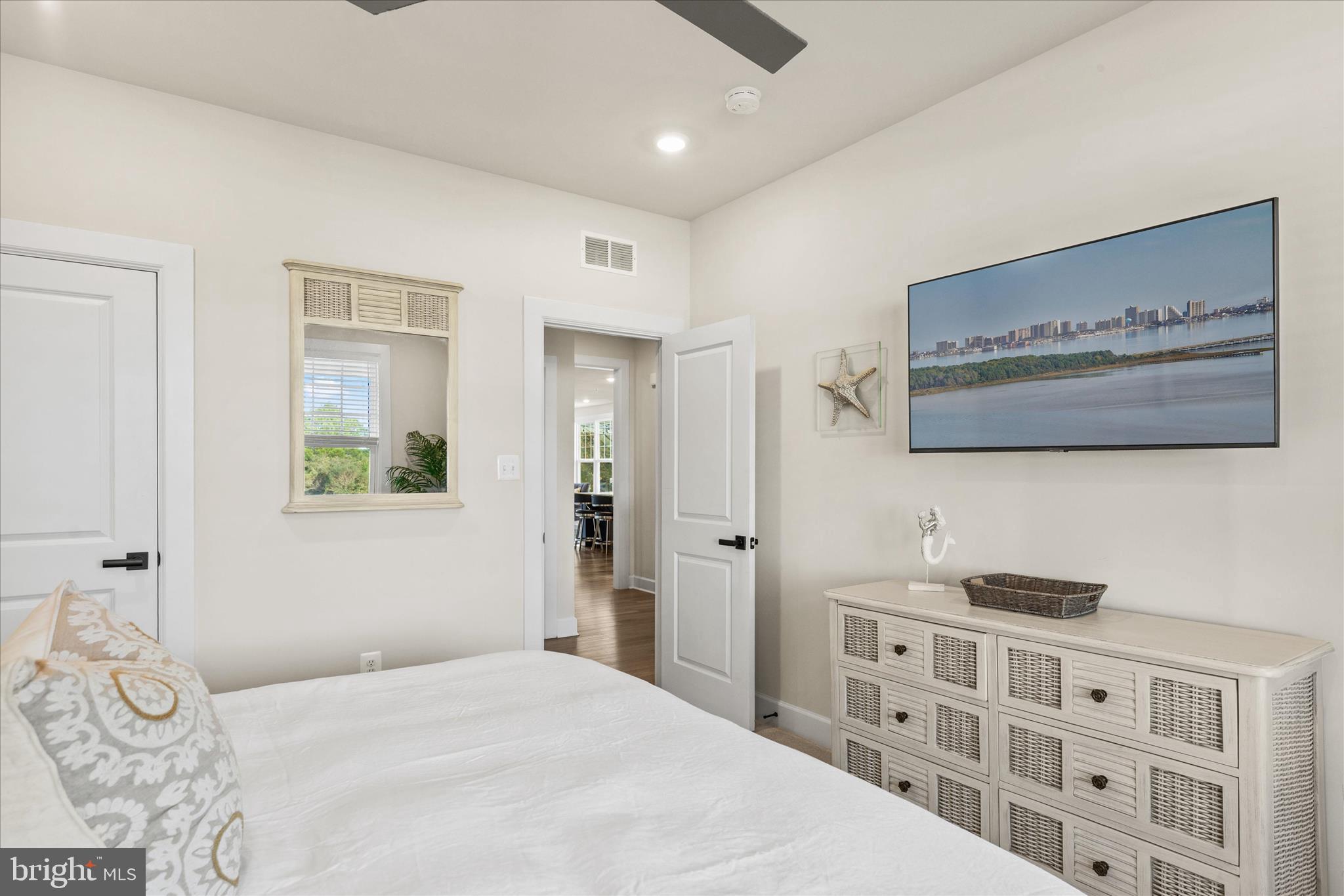 12377 Hidden Bay Drive Berlin, MD 21811 - Photo 21 of 71 a bedroom with a bed and a painting on the wall