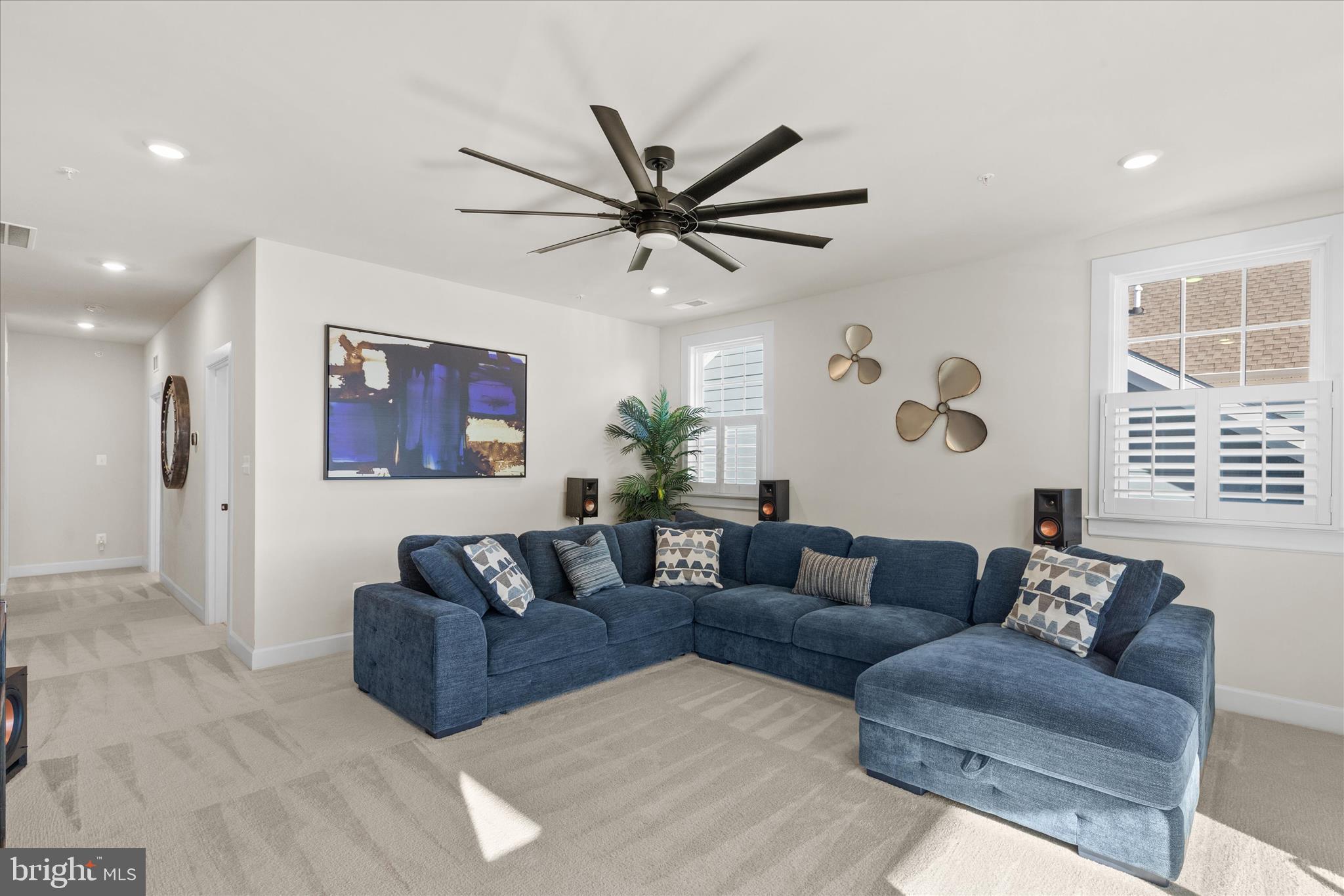 12377 Hidden Bay Drive Berlin, MD 21811 - Photo 37 of 71 a living room with furniture and a large window