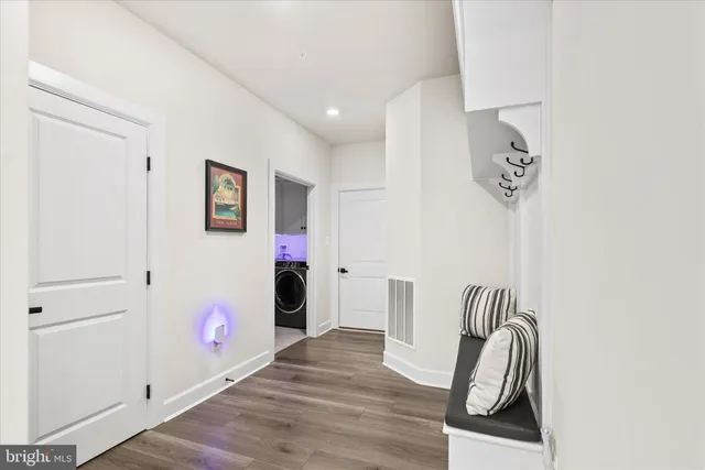 a view of an outdoor sitting area with furniture and garden view
