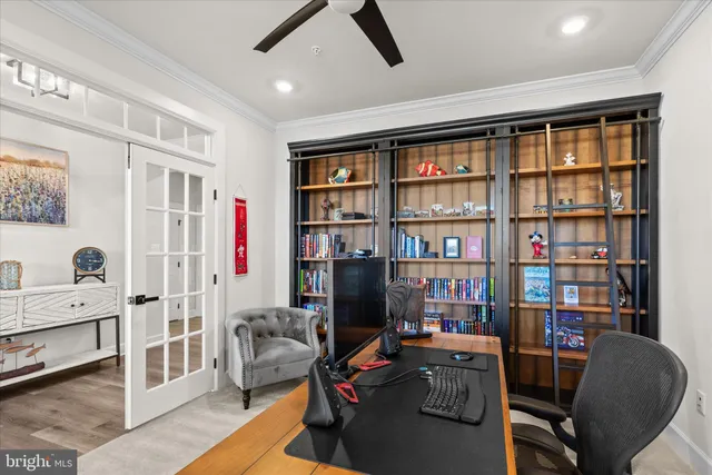 a work room with furniture and windows